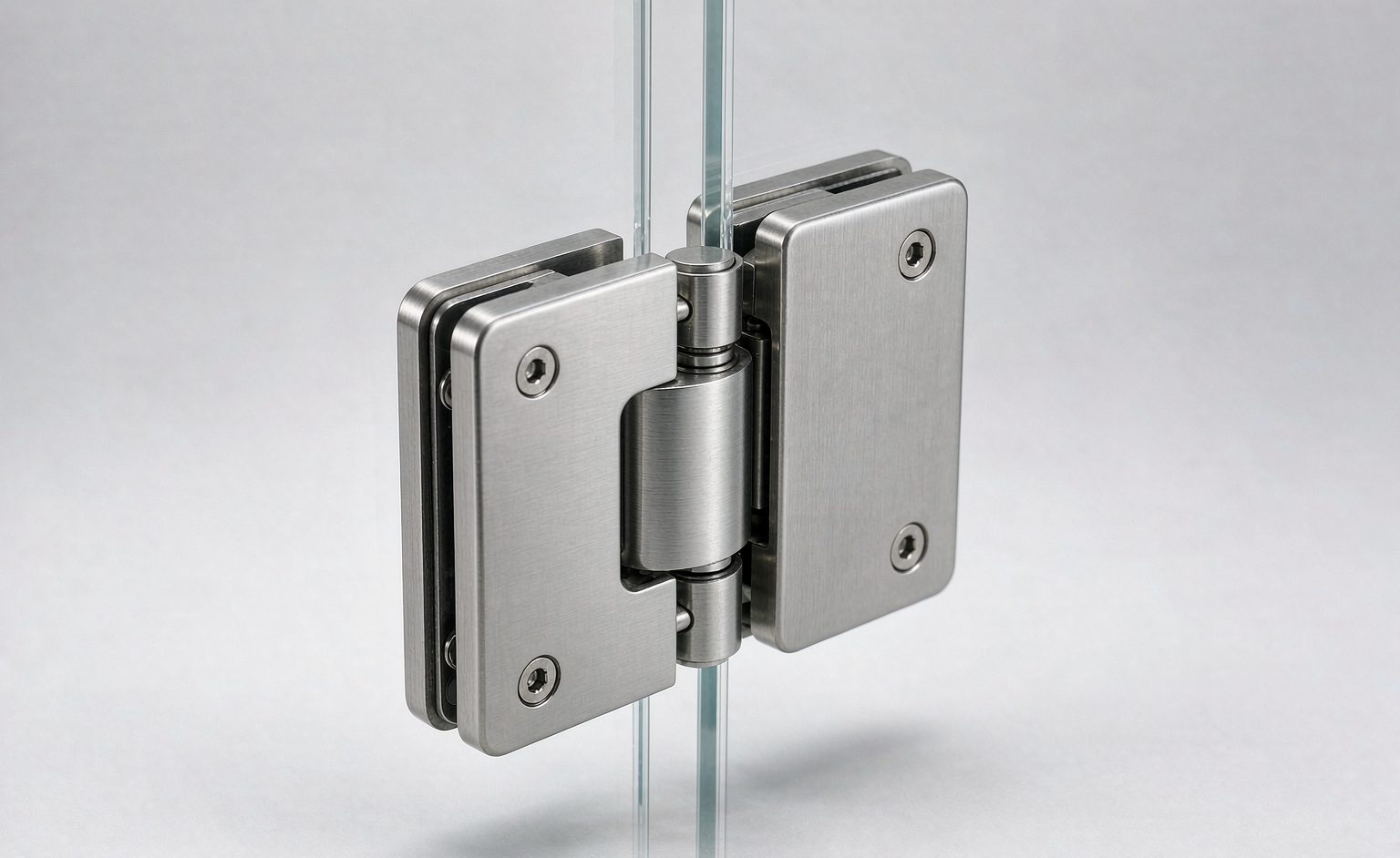 Soft-close frameless shower door hinge in brushed stainless finish